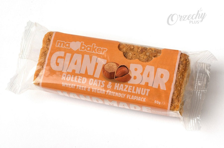 Baton owsiany „Ma Baker Giant Bar“ z orzechami laskowymi, 90 g